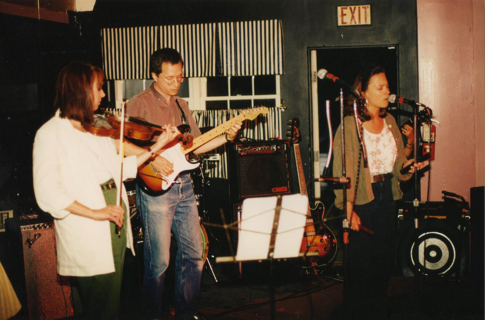 Melinda McCardell, Doug Hubley and Marcia Goldenberg during a Cowlix date at Norton\'s, opening for the Moxie Men, in 1992. Photo by Jeff Stanton.