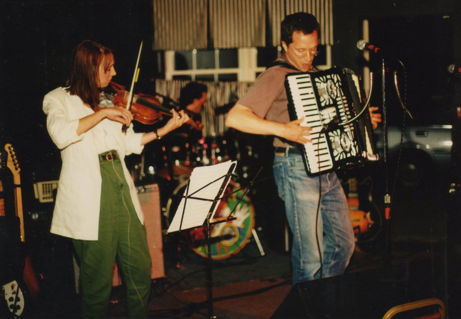 Melinda McCardell,  Jonathan Nichols-Pethick and Doug Hubley on stage during a Cowlix date at Norton\'s, opening for the Moxie Men, in 1992. Photo by Jeff Stanton.