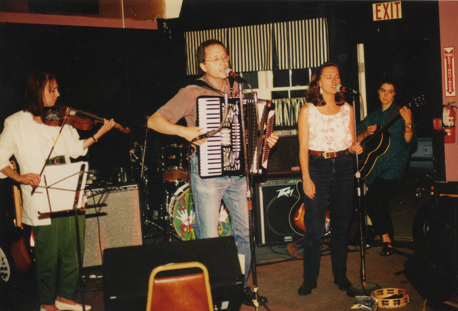 The Cowlix front line during the 1992 opening gig for the Moxie Men at Norton\'s in Kittery. From left, Melinda McCardell, Doug Hubley, Marcia Goldenberg, Gretchen Schaefer. Not visible is drummer Jonathan Nichols-Pethick. Photo by Jeff Stanton.