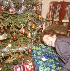 We all look for that Christmas feeling in our own ways. Me exaggerating my greed, but not by much. Circa 1979. Hubley Family photo.