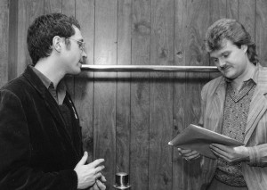 Backstage at the Cumberland County Civic Center in 1985, I give Ricky Scaggs copies of my Sunday Telegram article about him.