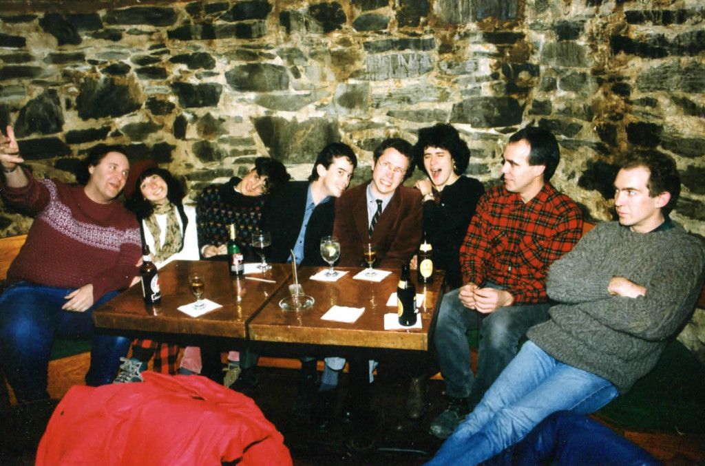 The cronies at the Bramhall Pub, late 1980s. From left: Alden Bodwell, Kathren Torraca, Elizabeth Torraca, Ken Reynolds, Doug Hubley, Gretchen Schaefer, Jeff Stanton, Steve Chapman. Photographer: Jeri Chapman.