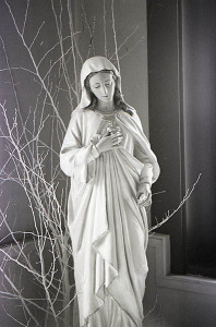 A statuette in The Cathedral of the Immaculate Conception, Portland, Maine, 1989. Digital scan from black & white negative / Hubley Archives.