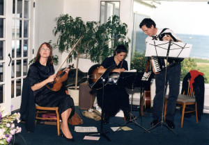 Cowlix gone rogue: Melinda, Gretchen and Doug playing obscure folk music at a wedding in October 1993. 