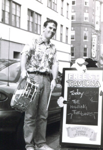 Bang a drum slowly and hold the stick lowly. Ken Reynolds at the Taverna, Aug. 1, 1999. Photo by Jeff Stanton.