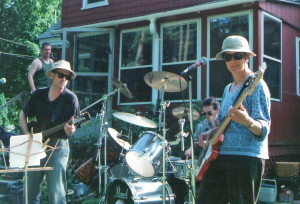 With our host Bob Gallagher shown at upper left, the Howling Turbines perform at a party circa 2002. Photo by Jeff Stanton.