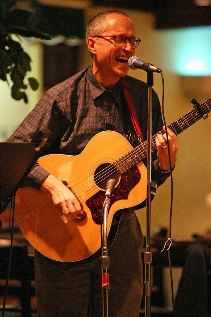  Doug during the Everly Brothers' "Cathy's Clown" -- the "Magic Fingers" capo gives it away -- during Day for Night's Nov. 30, 2007 show at Bates College's Bobcat Den. Photo by H. Lincoln Benedict.